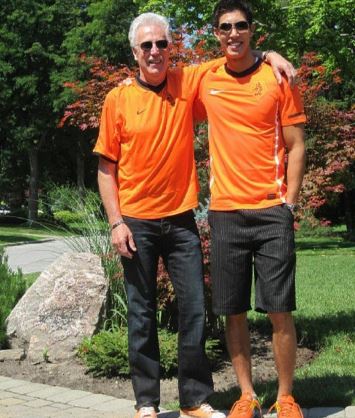 Karl with his Dad wearing matching outfits
